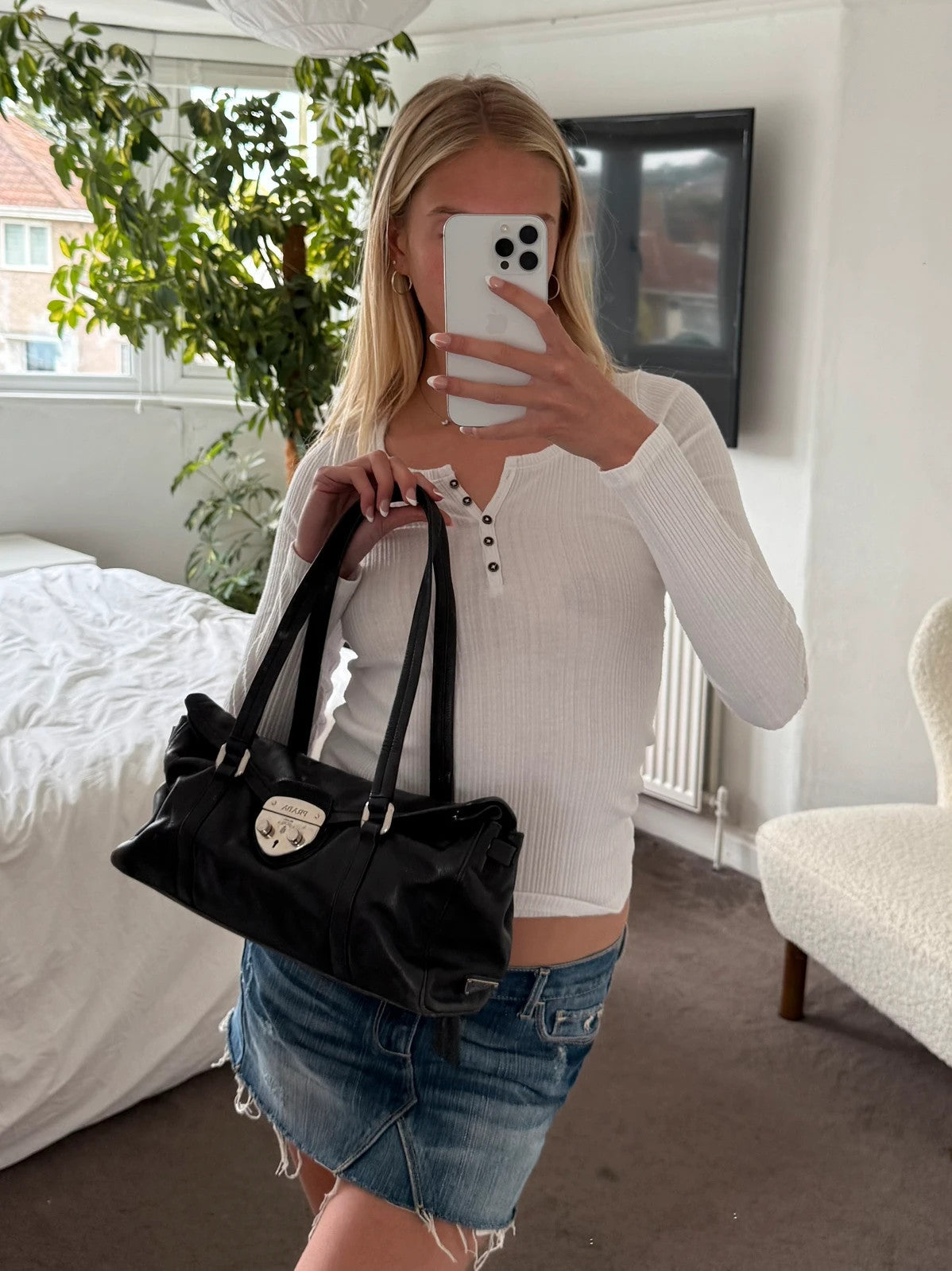 Black leather Prada bag