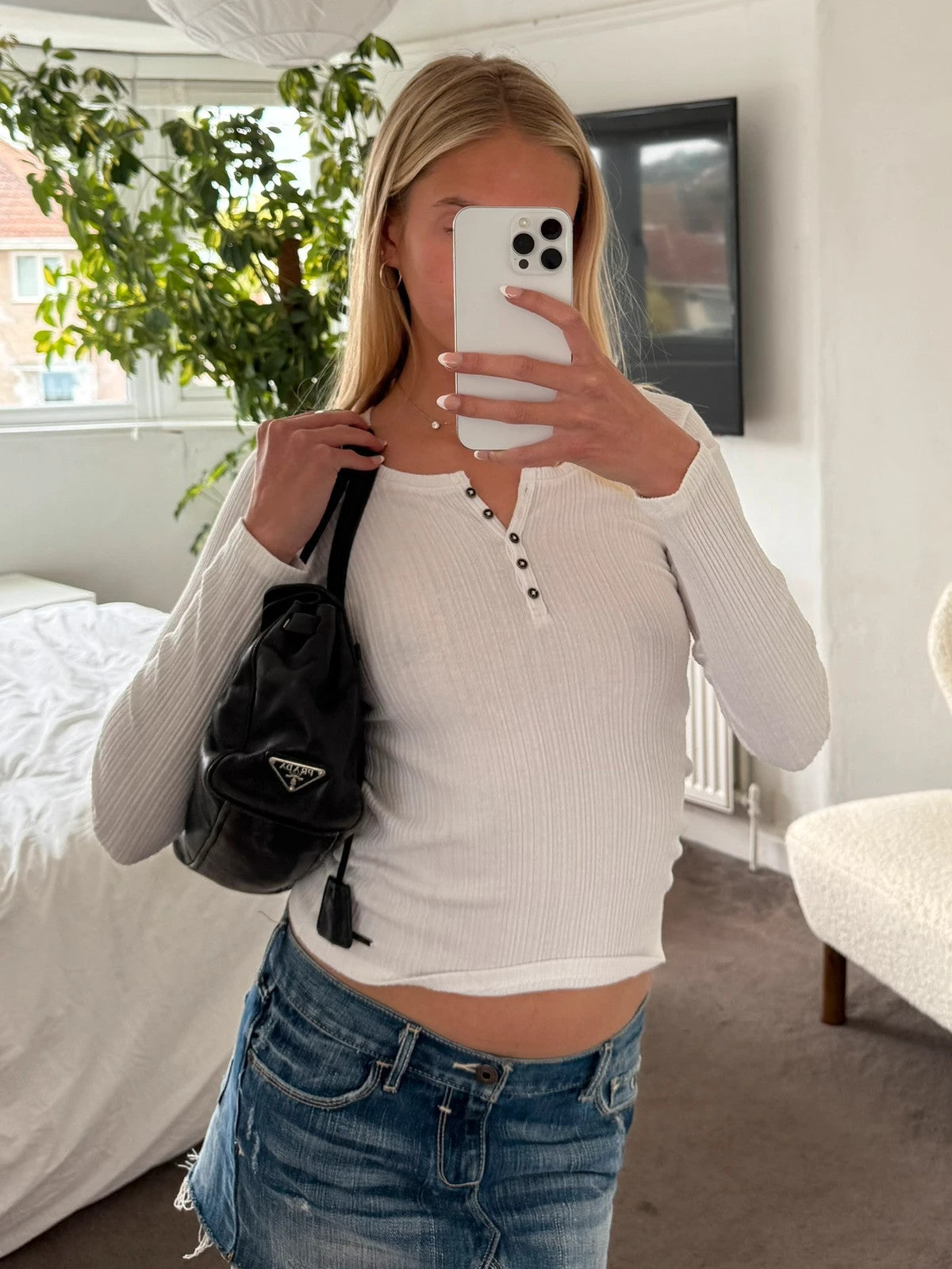 Black leather Prada bag