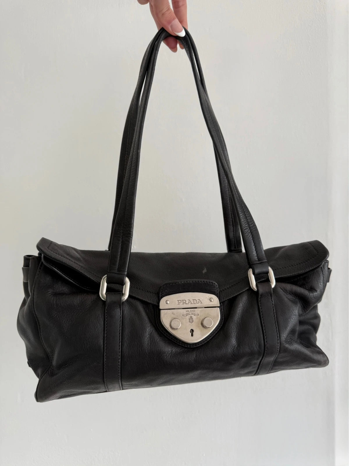 Black leather Prada bag