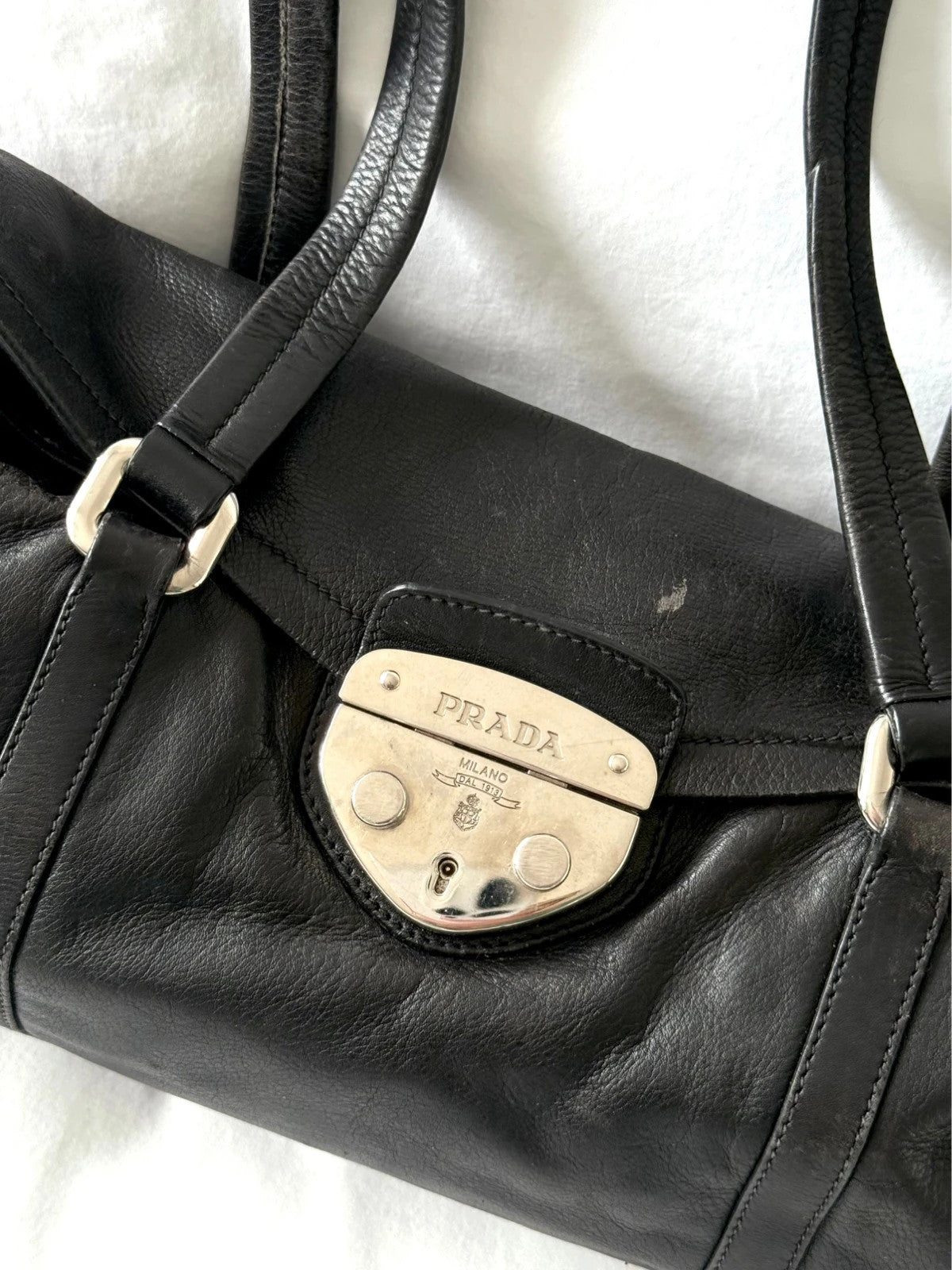 Black leather Prada bag