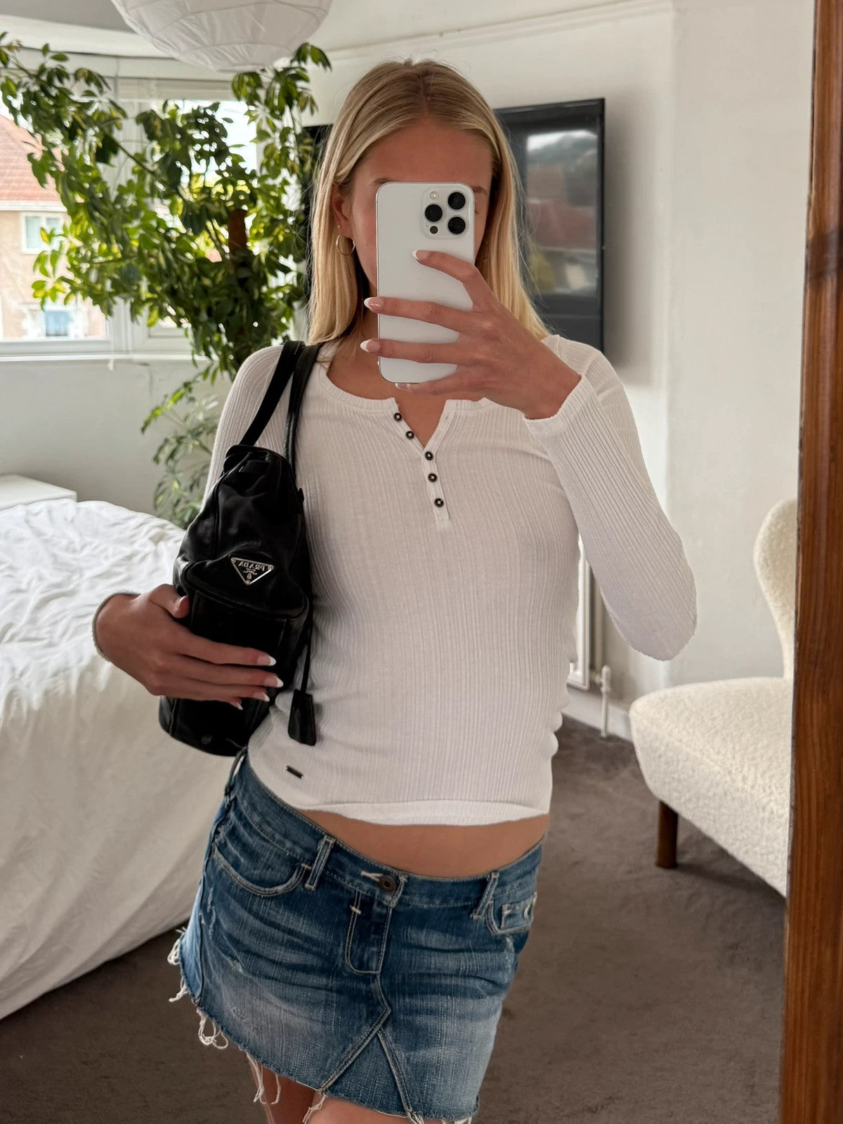 Black leather Prada bag