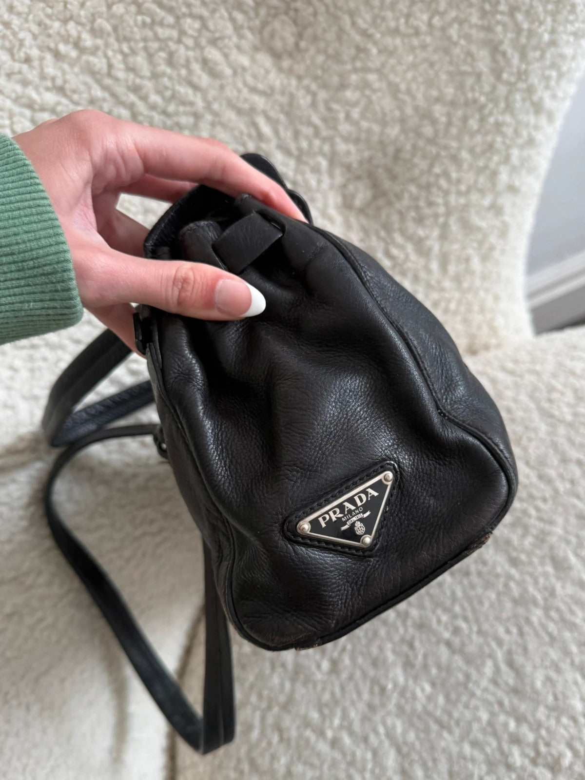 Black leather Prada bag