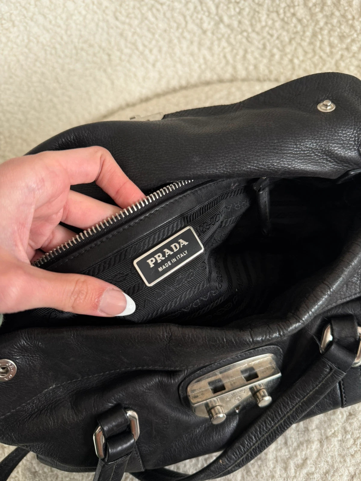 Black leather Prada bag