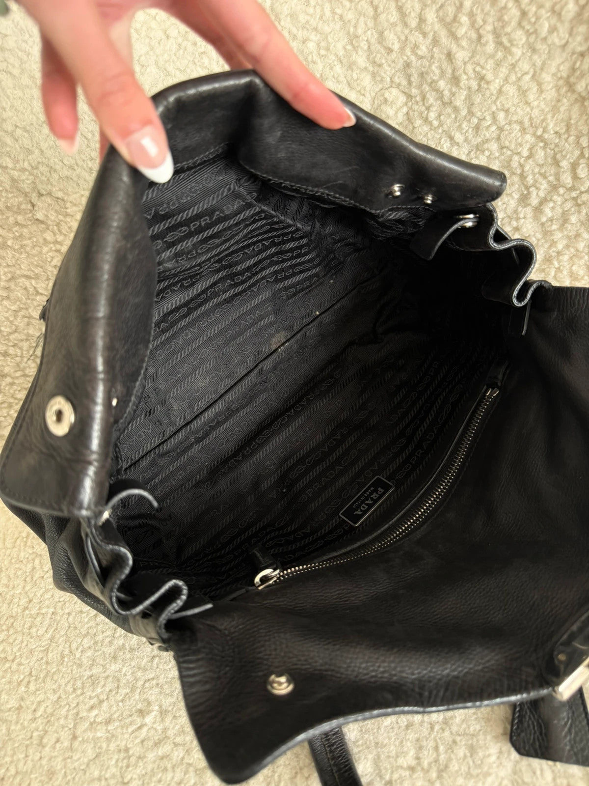 Black leather Prada bag