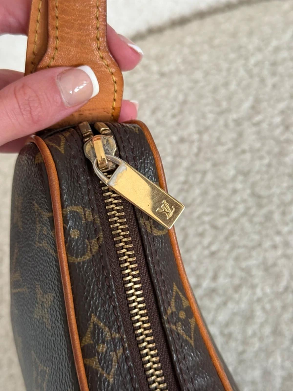 Louis Vuitton monogram croissant mini shoulder bag.