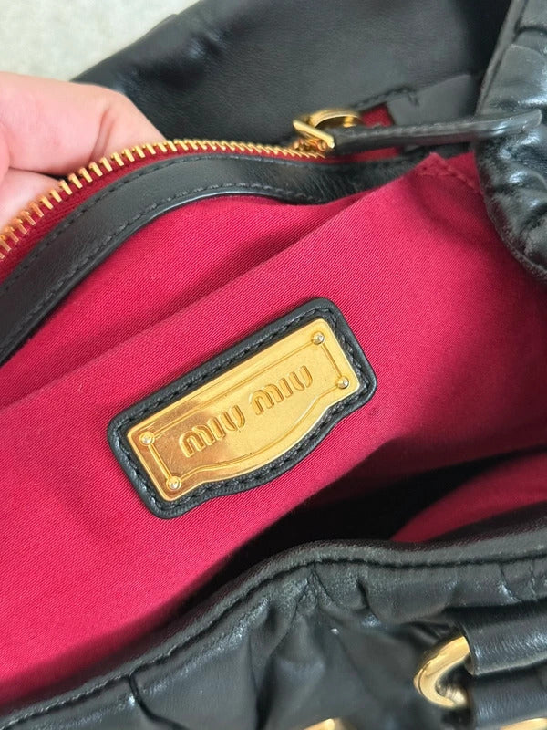 miu miu black matelassé leather coffer bag