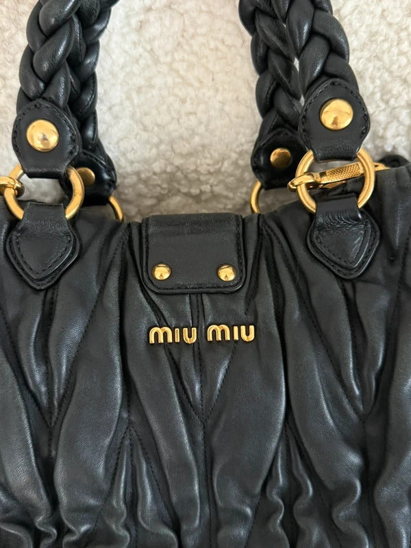 miu miu black matelassé leather coffer bag