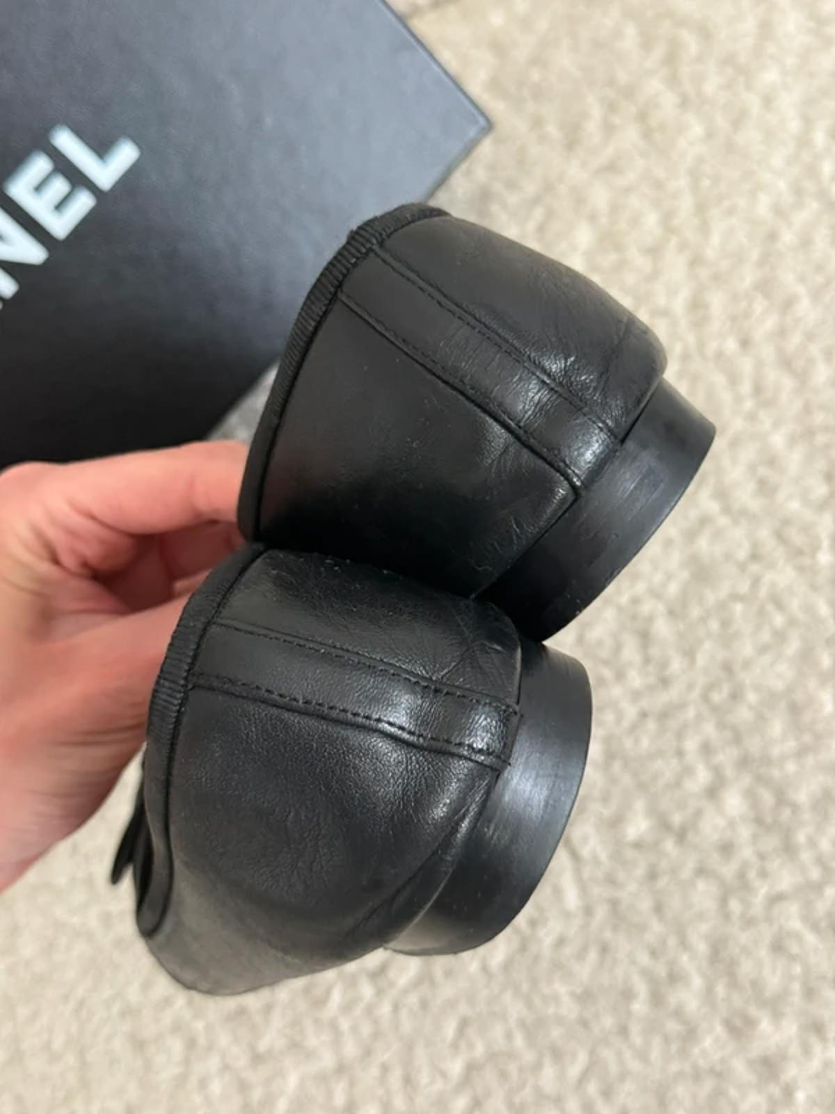 Chanel black leather ballet flats