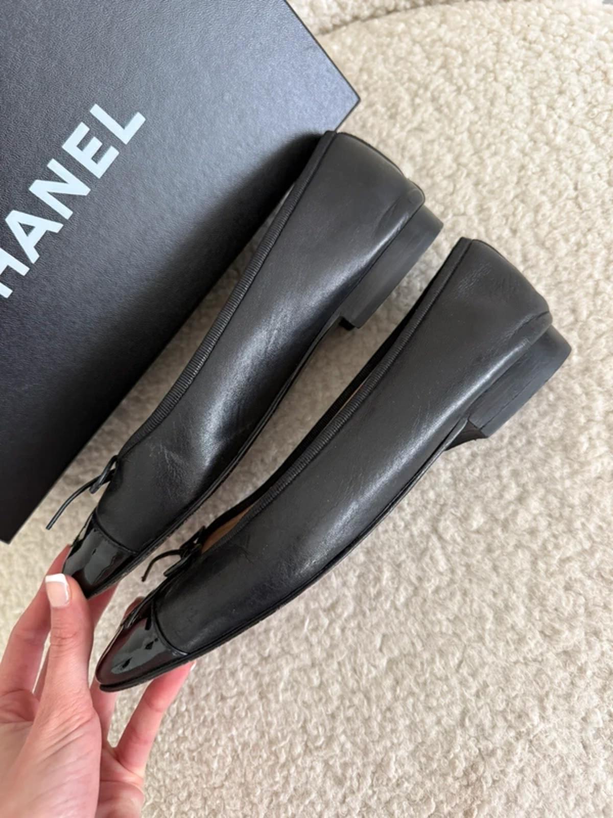 Chanel black leather ballet flats