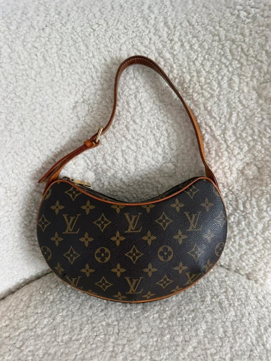 Louis Vuitton monogram croissant mini shoulder bag.