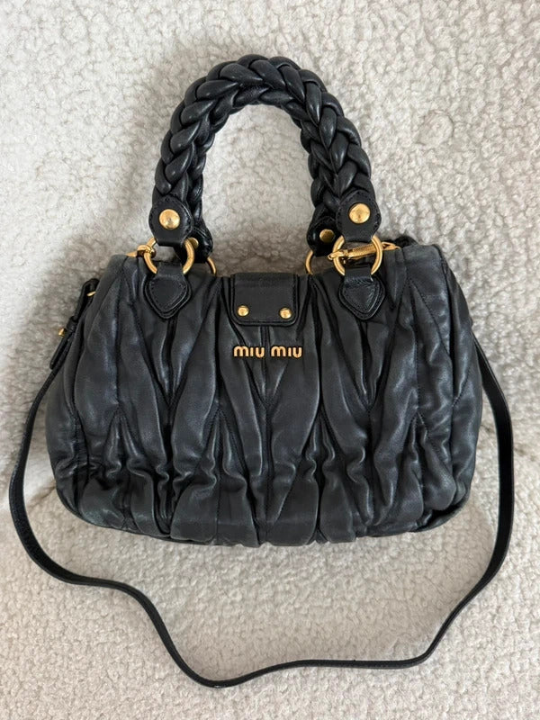 miu miu black matelassé leather coffer bag