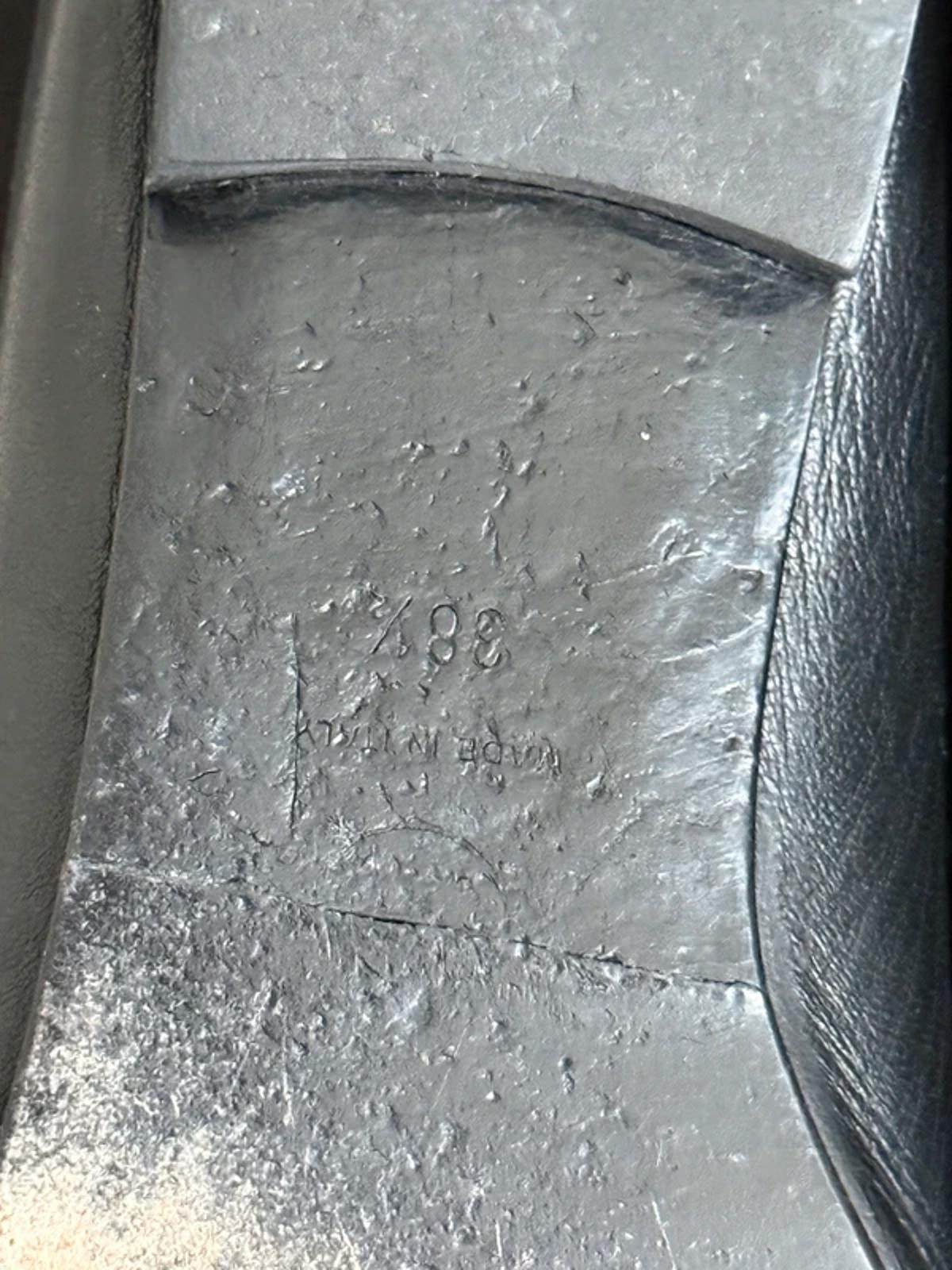 Chanel black leather ballet flats