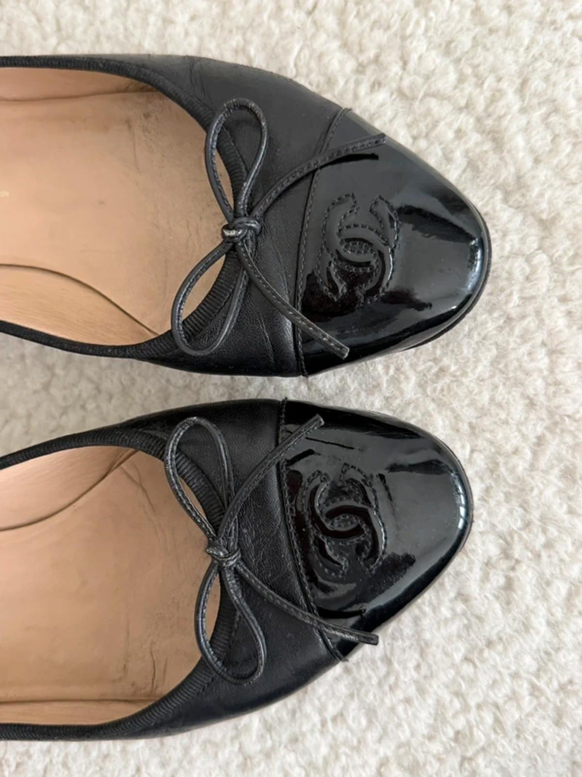 Chanel black leather ballet flats