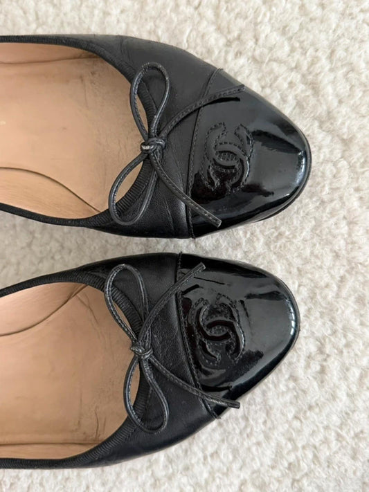 Chanel black leather ballet flats
