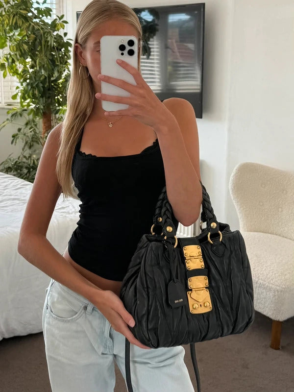 miu miu black matelassé leather coffer bag
