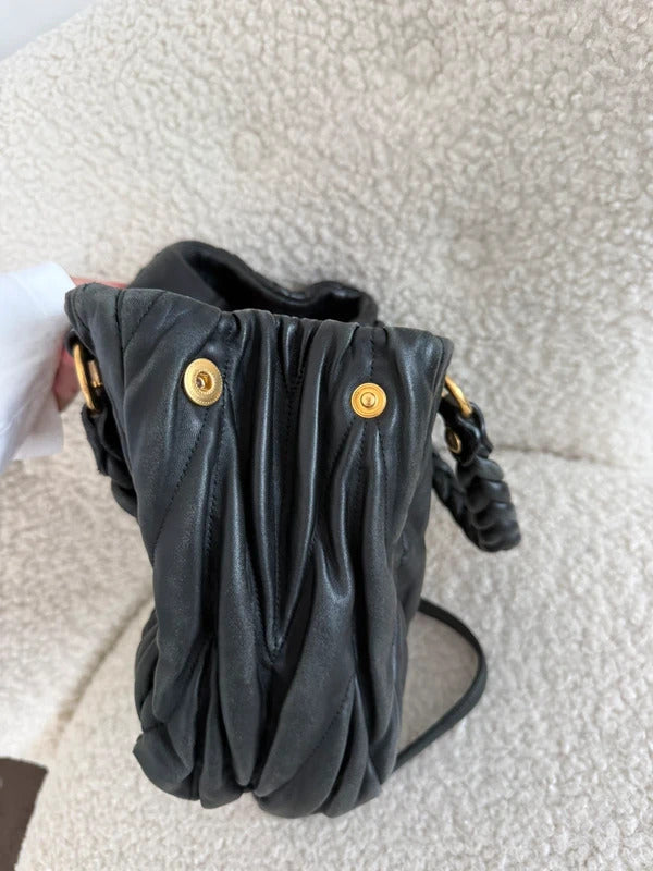 miu miu black matelassé leather coffer bag