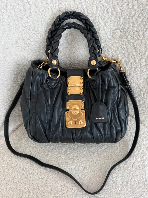 miu miu black matelassé leather coffer bag